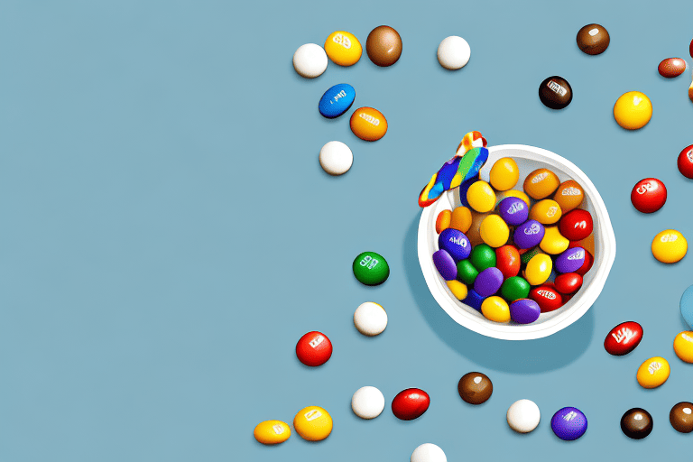 A curious dog looking longingly at a bowl of peanut m&m's on a table